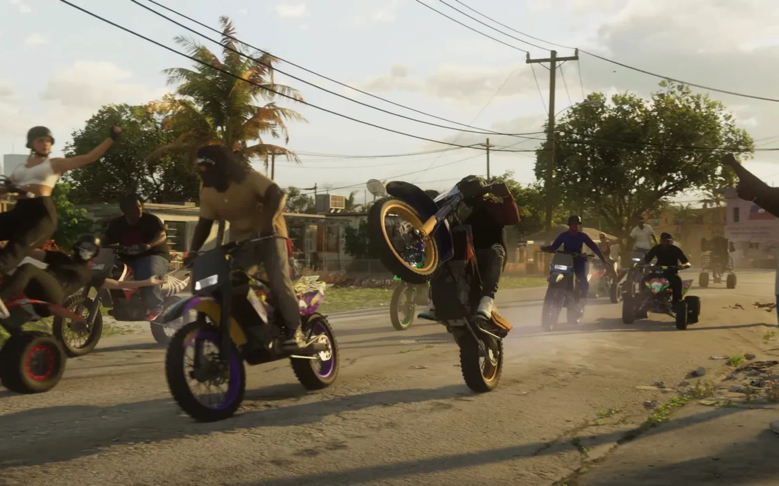Dirt bike riders pulling wheelies down a Leonida street in GTA 6.