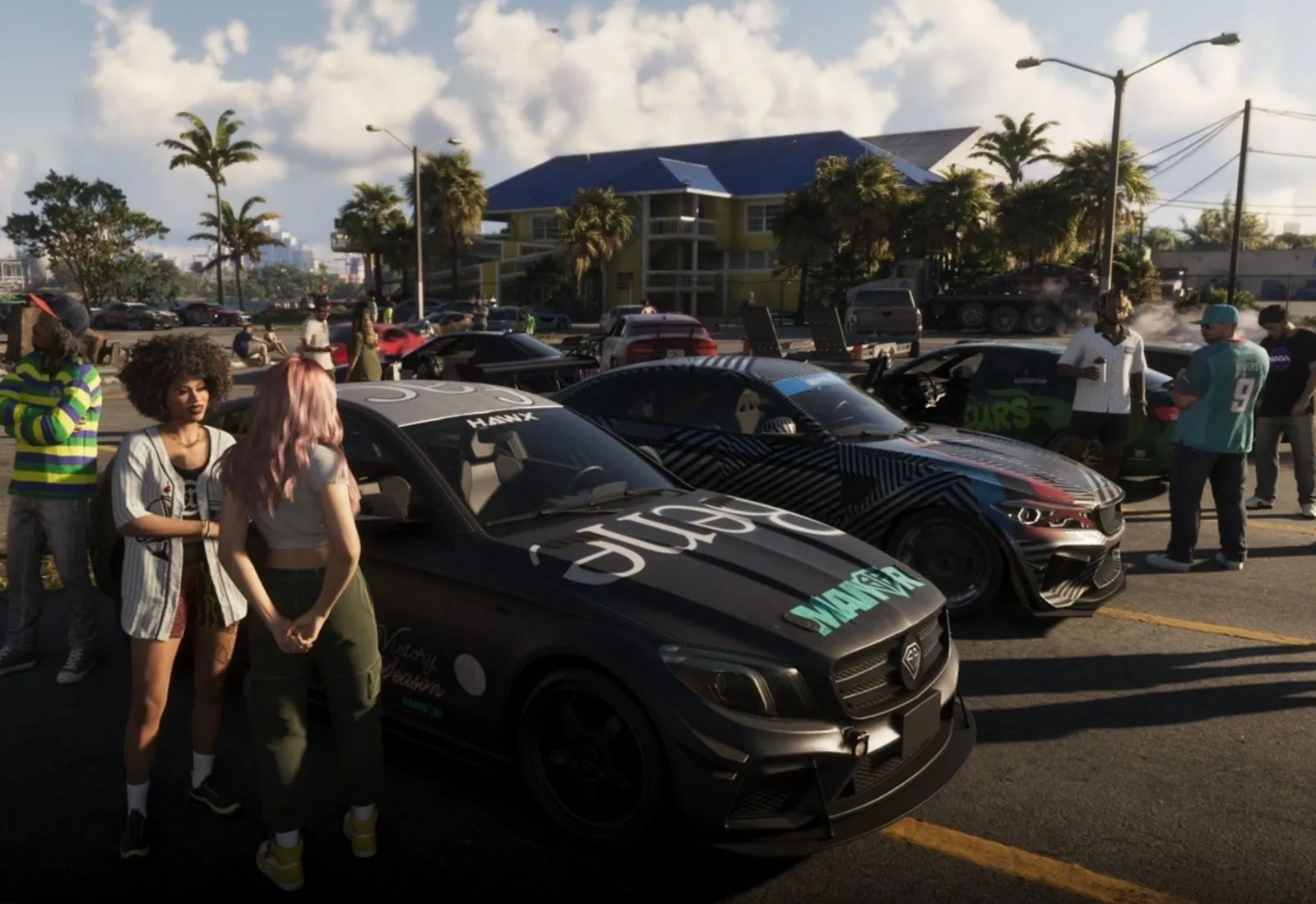 Crowd gathered around muscle cars at a street meet in GTA 6.