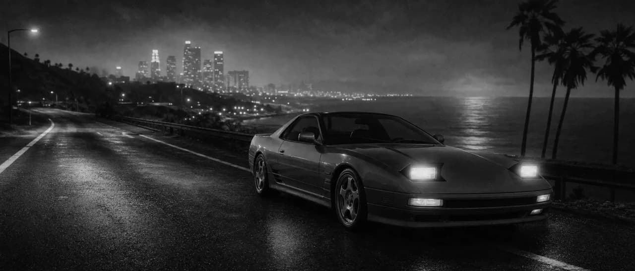 Black and white cinematic concept image of a sleek American two-seat sports car on a coastal highway at night