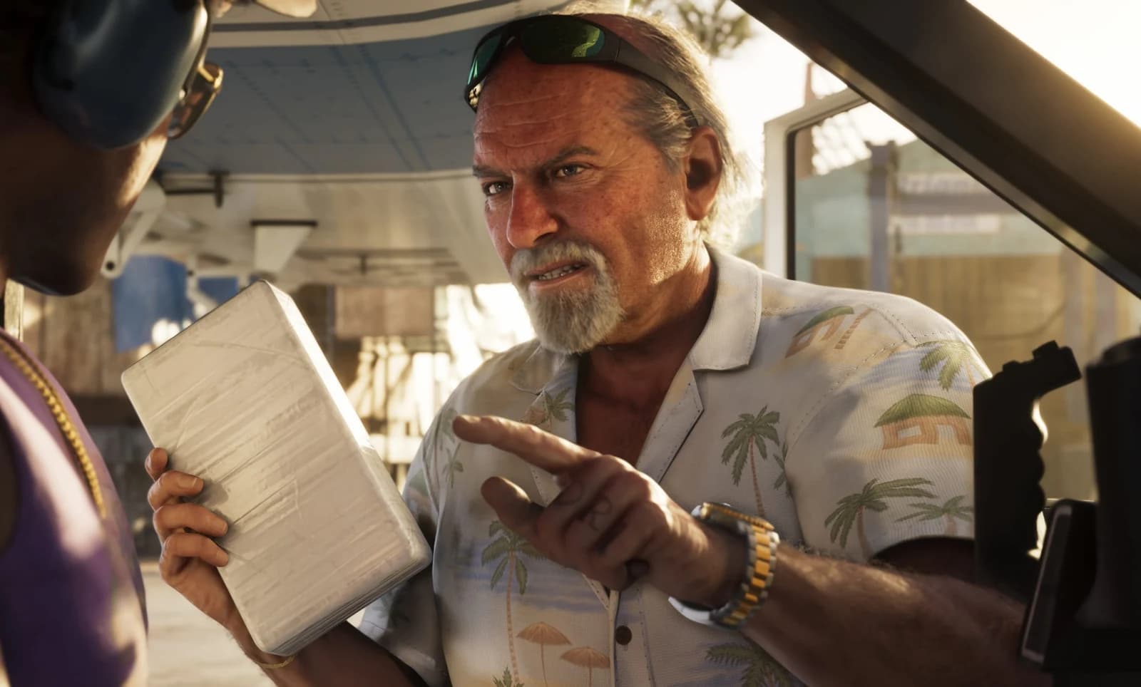 Brian Heder leaning out of a truck window in the Leonida swamps, wearing wraparound sunglasses, a black tank top, and a heavy gold bracelet.