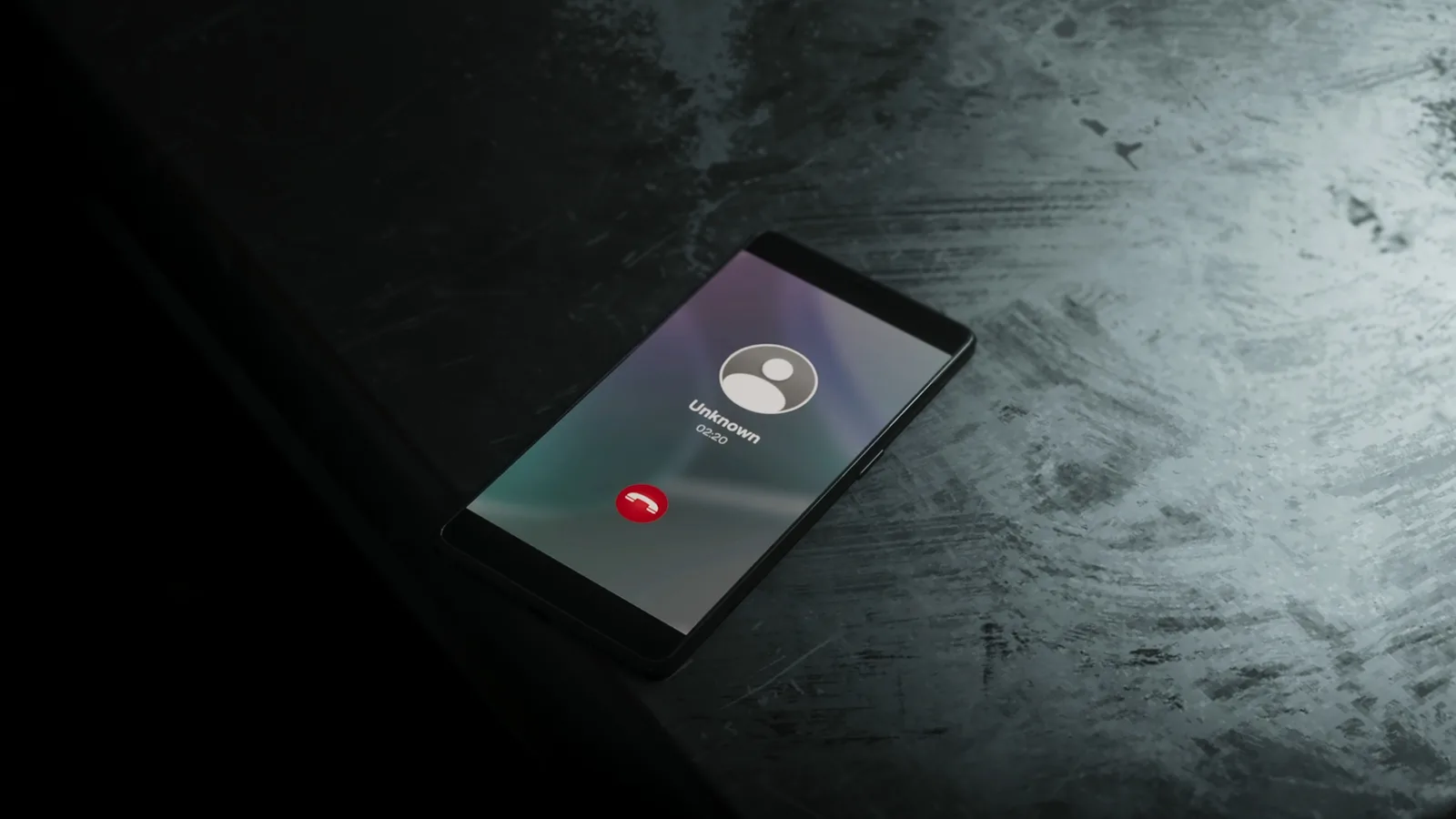 A phone on a dark surface lights up with Ernesto’s incoming call in the GTA 6 Extended Look.