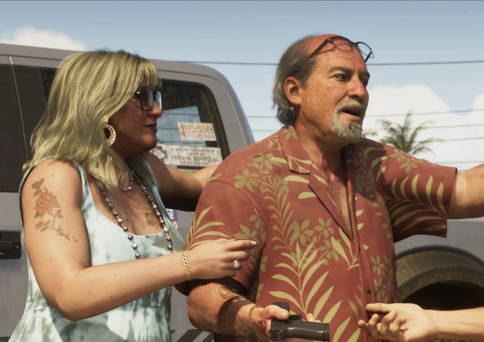 Lori Heder leaning out of a car window in Trailer 2, blonde hair and oversized sunglasses, rose tattoo on her shoulder.
