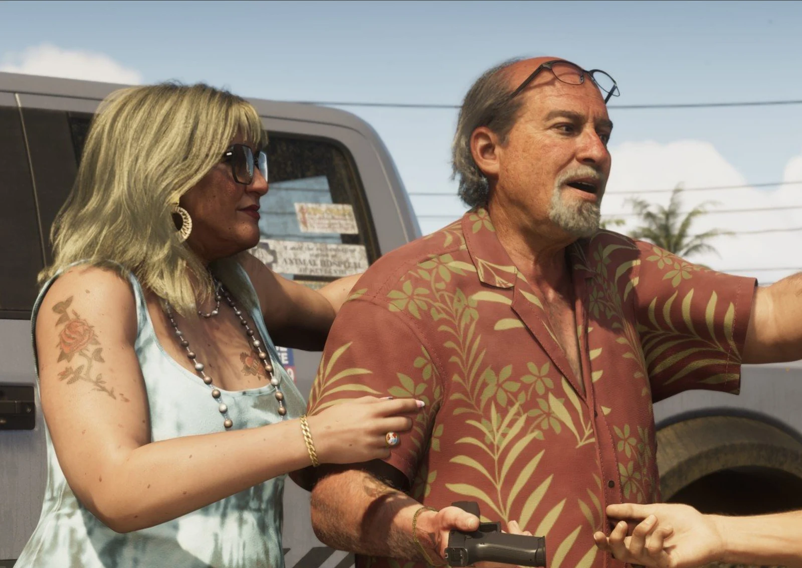 Lori Heder leaning out of a car window in Trailer 2, blonde hair and oversized sunglasses, rose tattoo on her shoulder.
