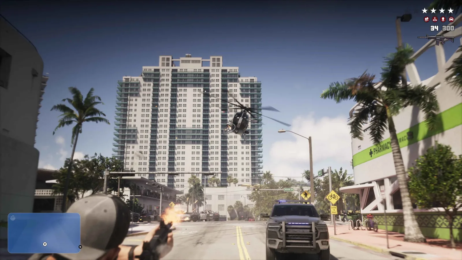 Police chase in GTA 6 with the minimap, wanted stars and combat HUD all visible on screen