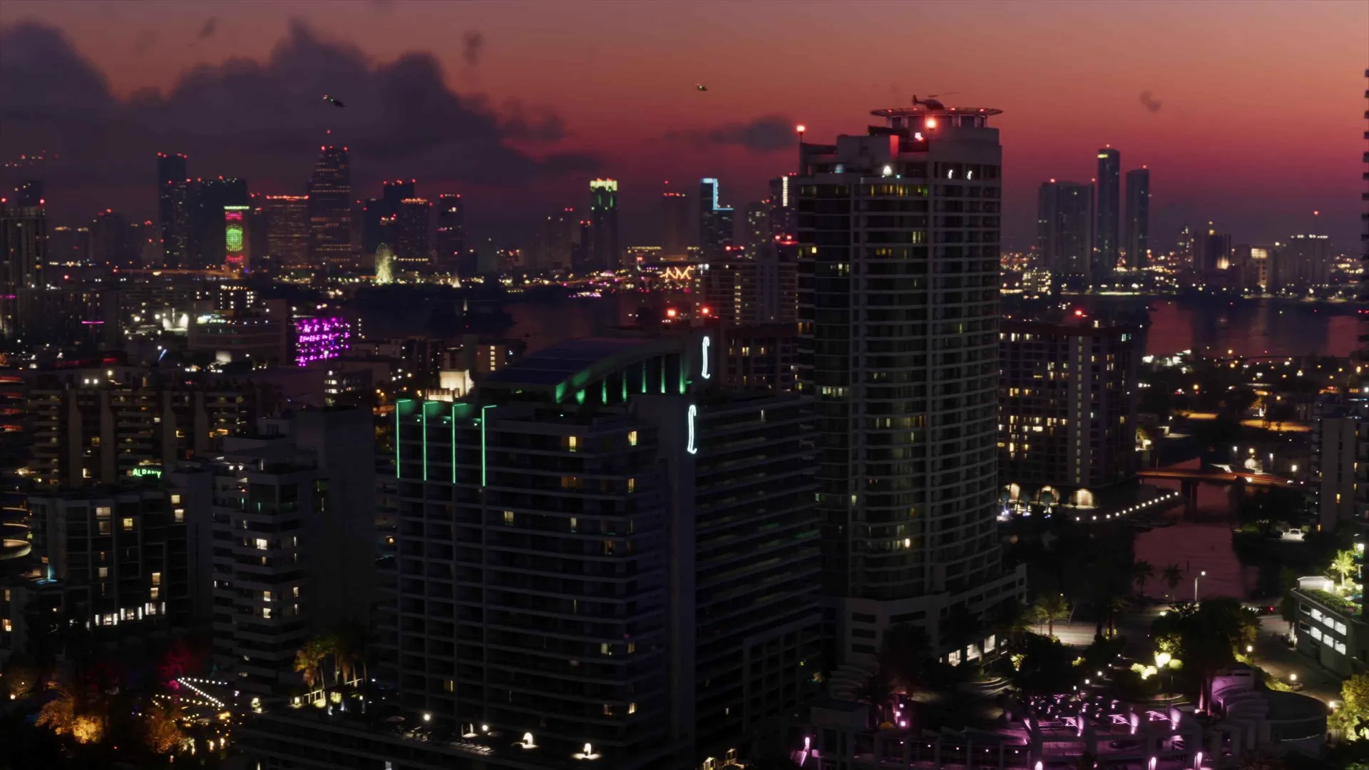 Downtown Vice City towers glowing at night in a frame from the GTA 6 Extended Look