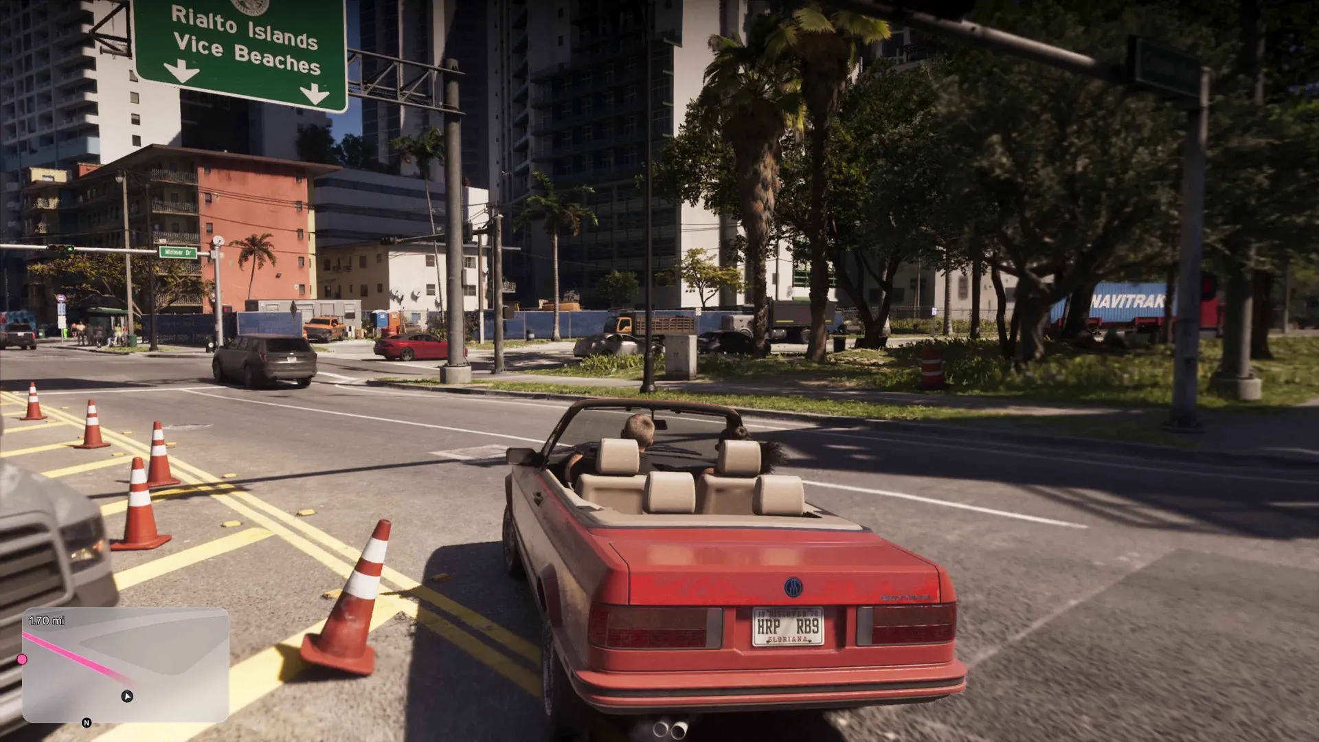 A red convertible waits at a coned-off junction under a Rialto Islands and Vice Beaches road sign with a minimap showing a magenta route in GTA 6