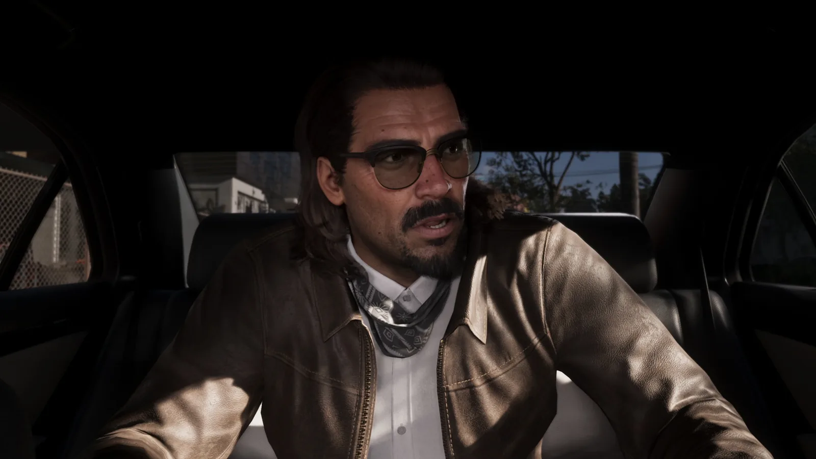 Raul Bautista in the back seat of the getaway car during the GTA 6 Extended Look chase