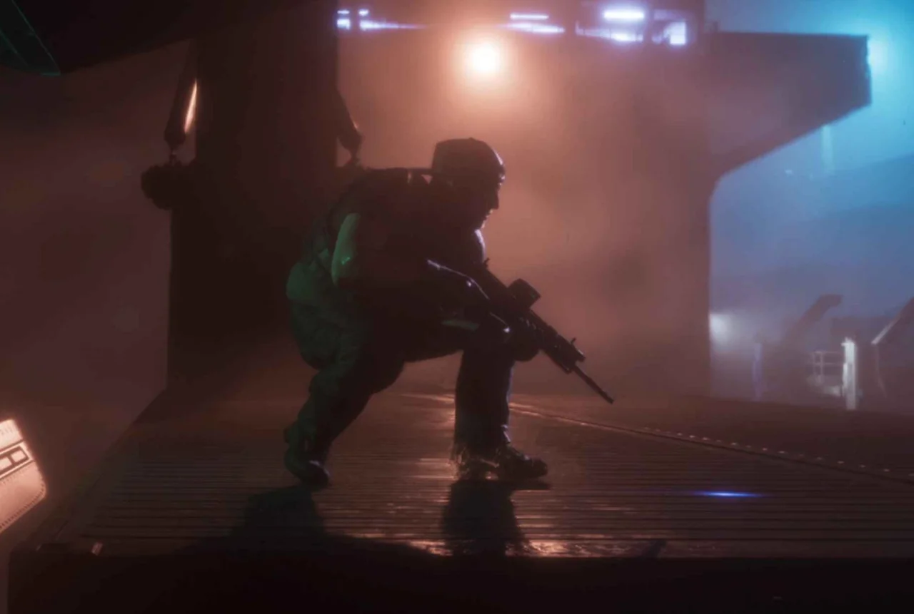Figure crouched on a night-time dock holding a SCAR assault rifle under cold floodlights in GTA 6