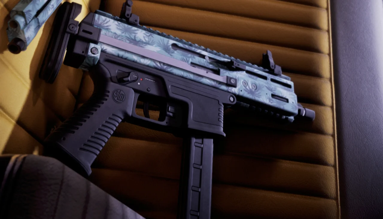 Palm-pattern S&M DW9 compact SMG resting on a tan leather car seat in GTA 6
