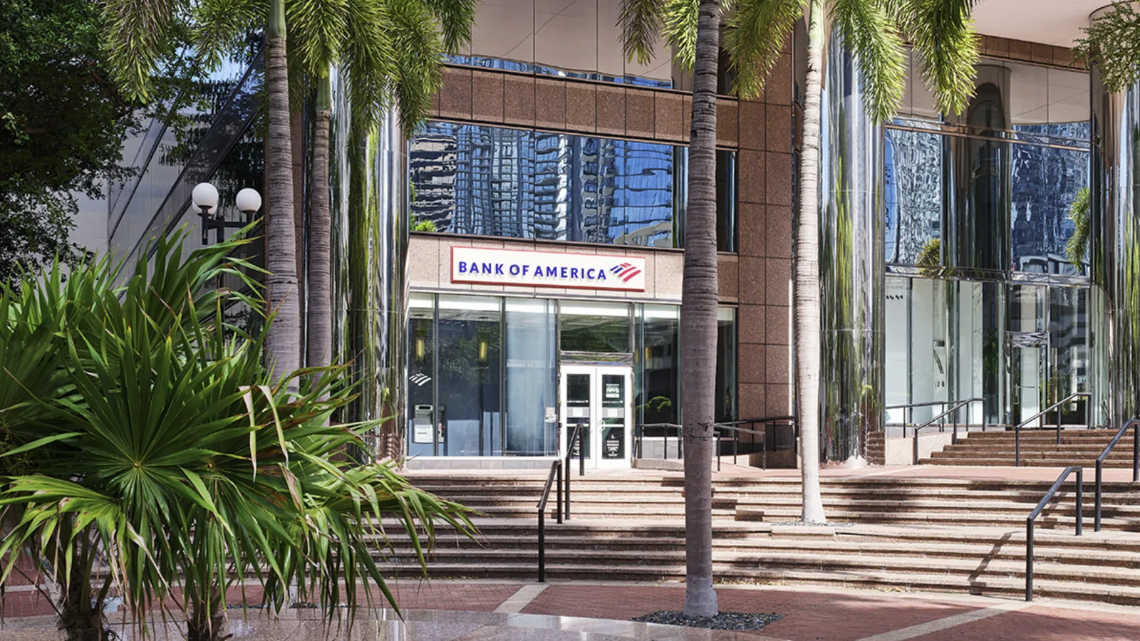 The columned entrance of a downtown bank branch
