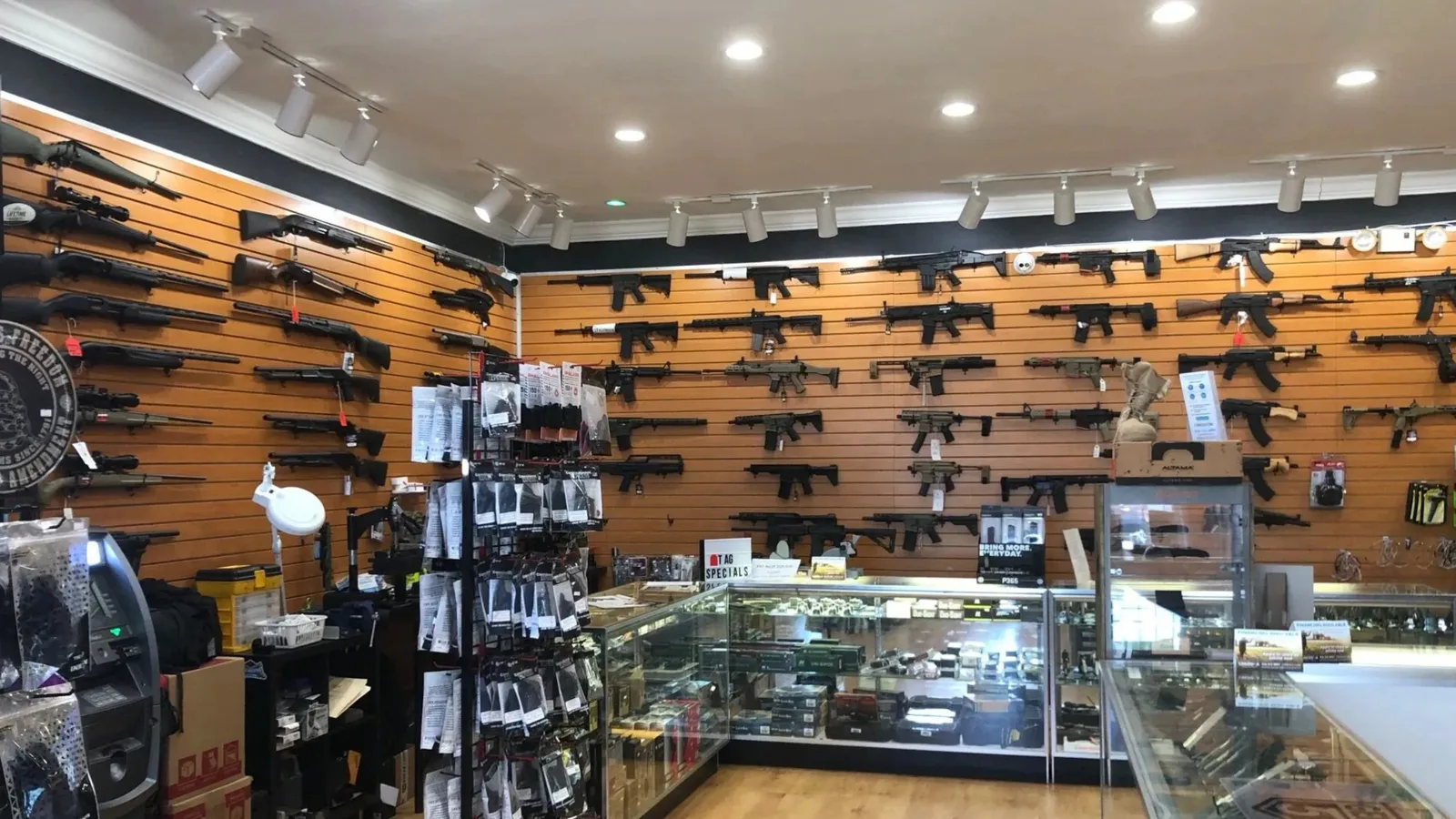 Rifles lining the walls of an American gun store