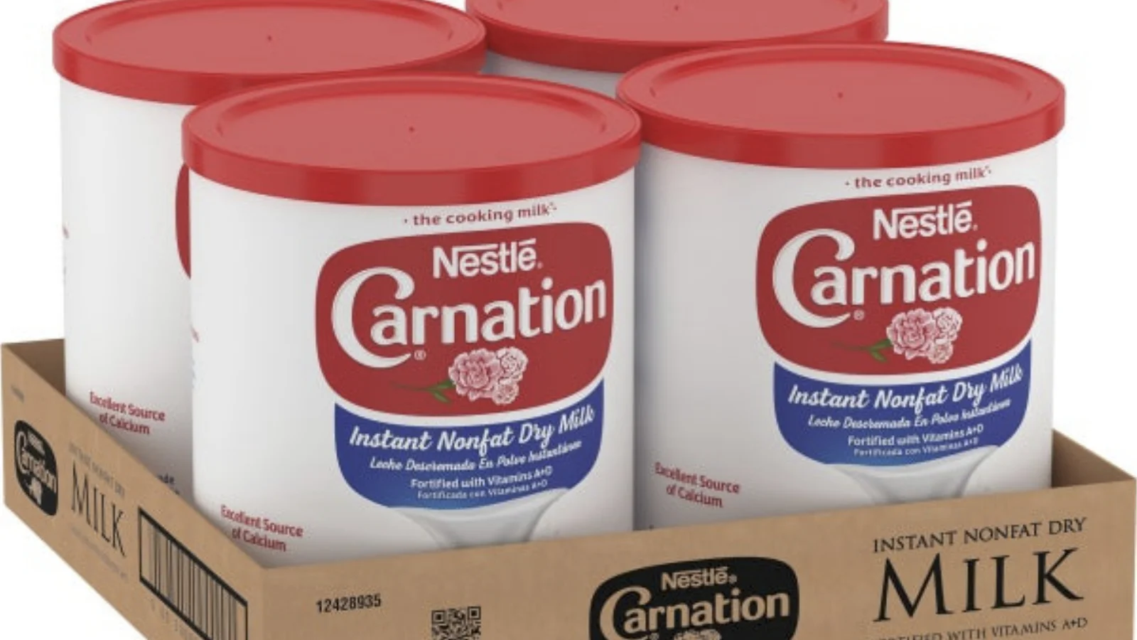Carnation instant dry milk canisters in a shipping tray