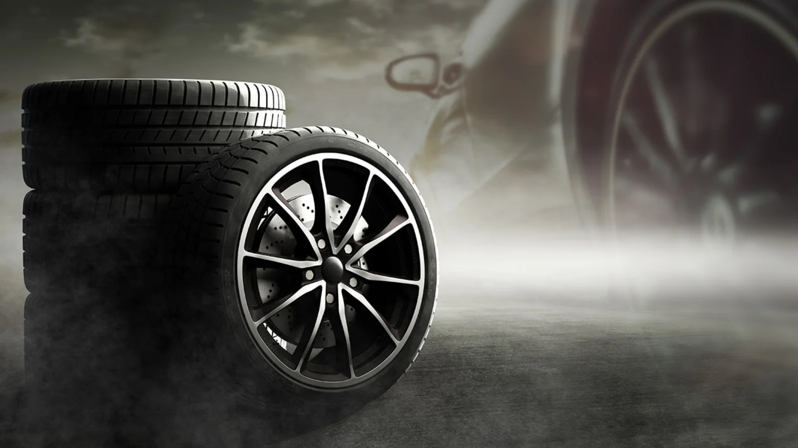A performance tyre on a black alloy wheel in studio mist