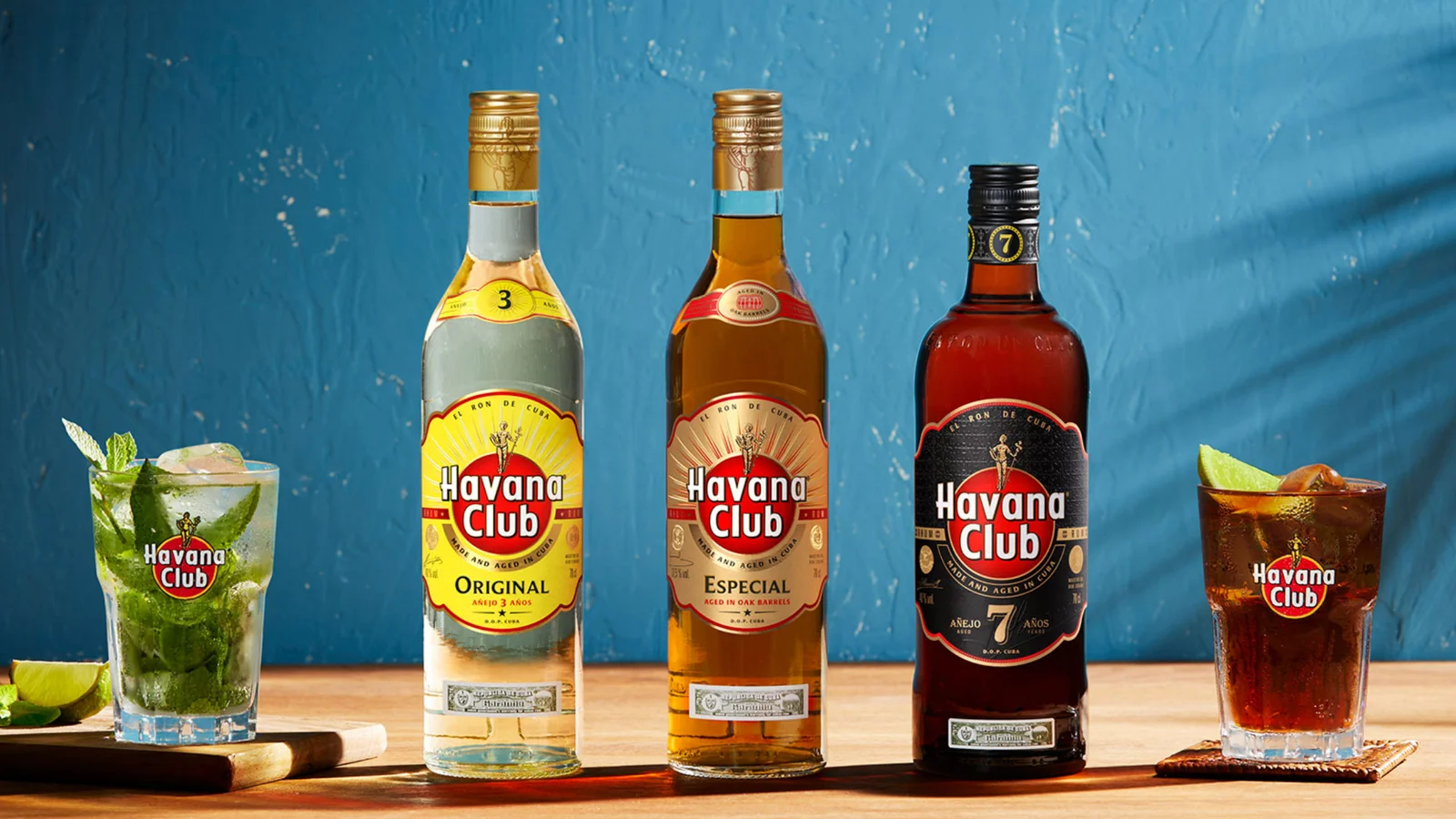 Havana Club rum bottles with mojito and cola serves