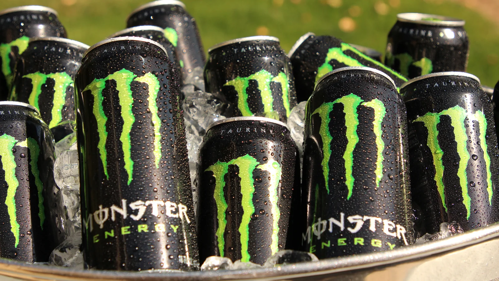 Monster Energy cans stacked on ice