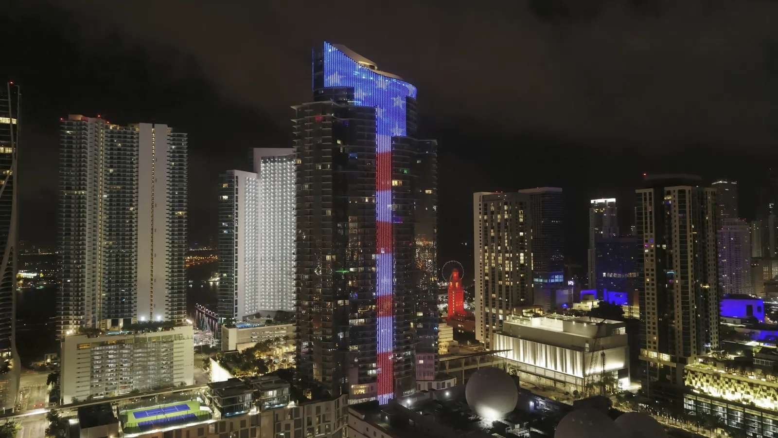 Downtown Miami skyline at night with the Paramount Miami Worldcenter tower lit up