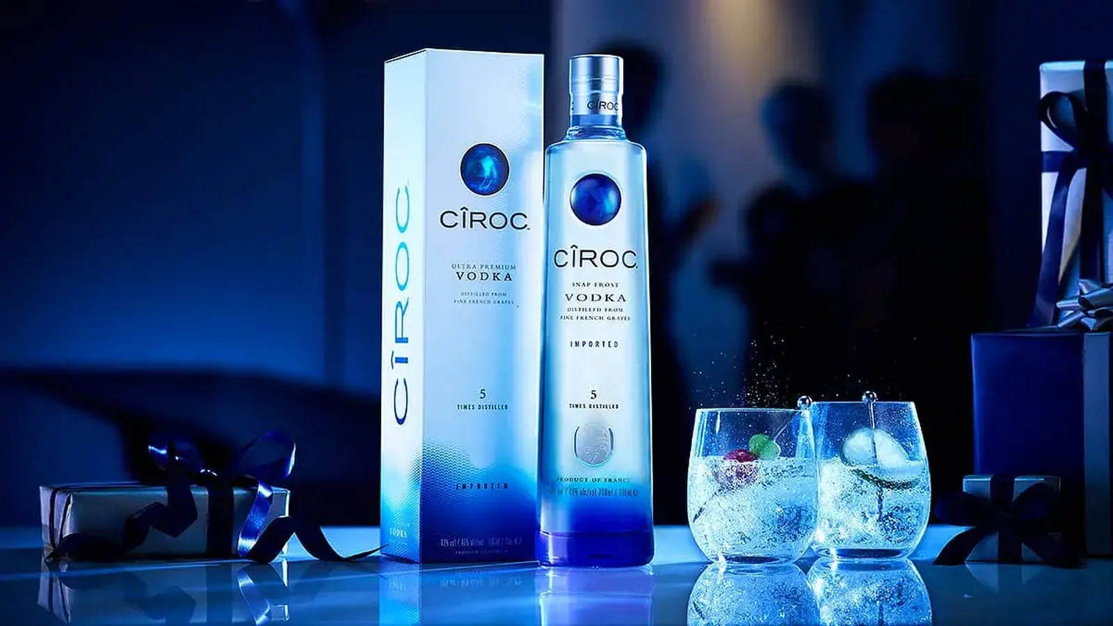A Cîroc vodka bottle and box on a bar counter