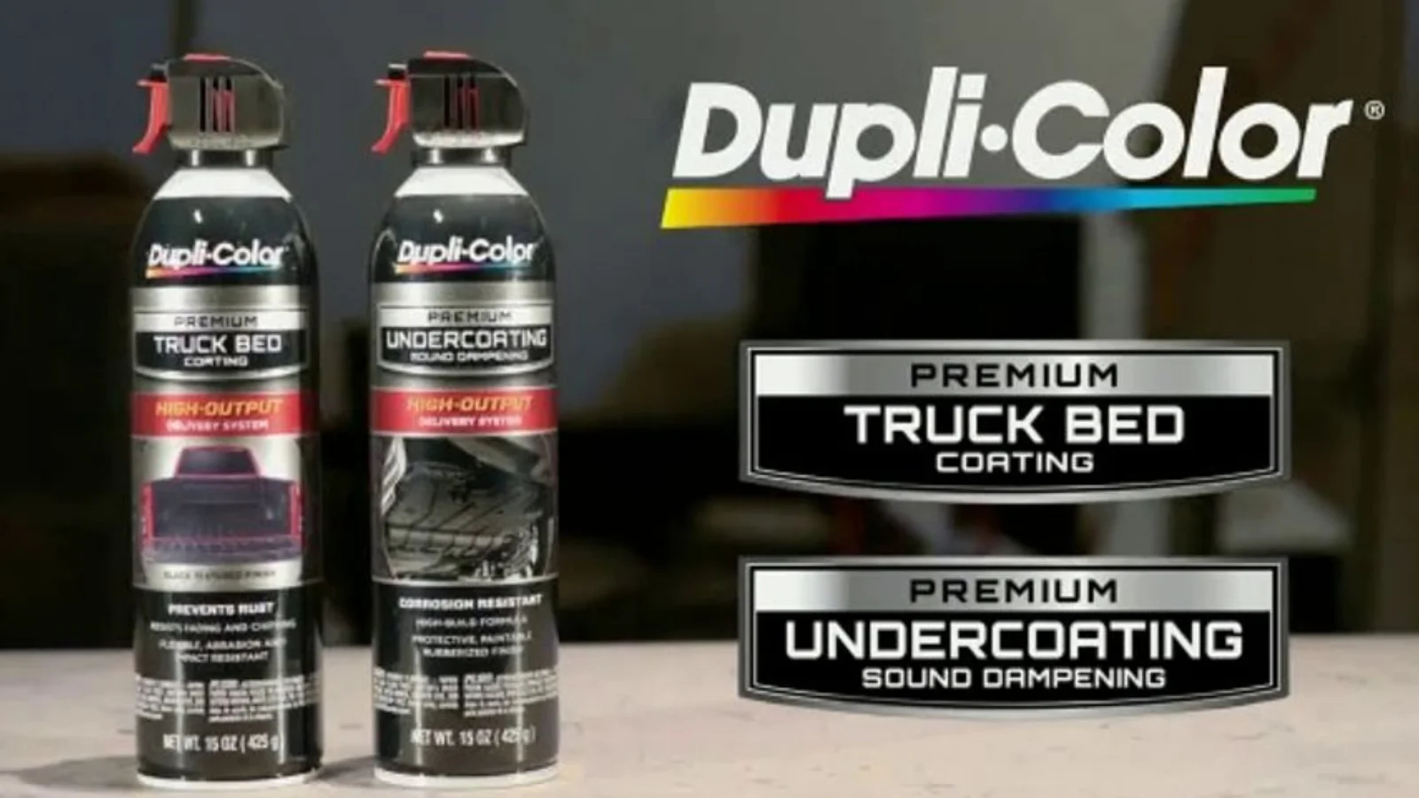 Dupli-Color truck bed coating spray cans in a studio shot