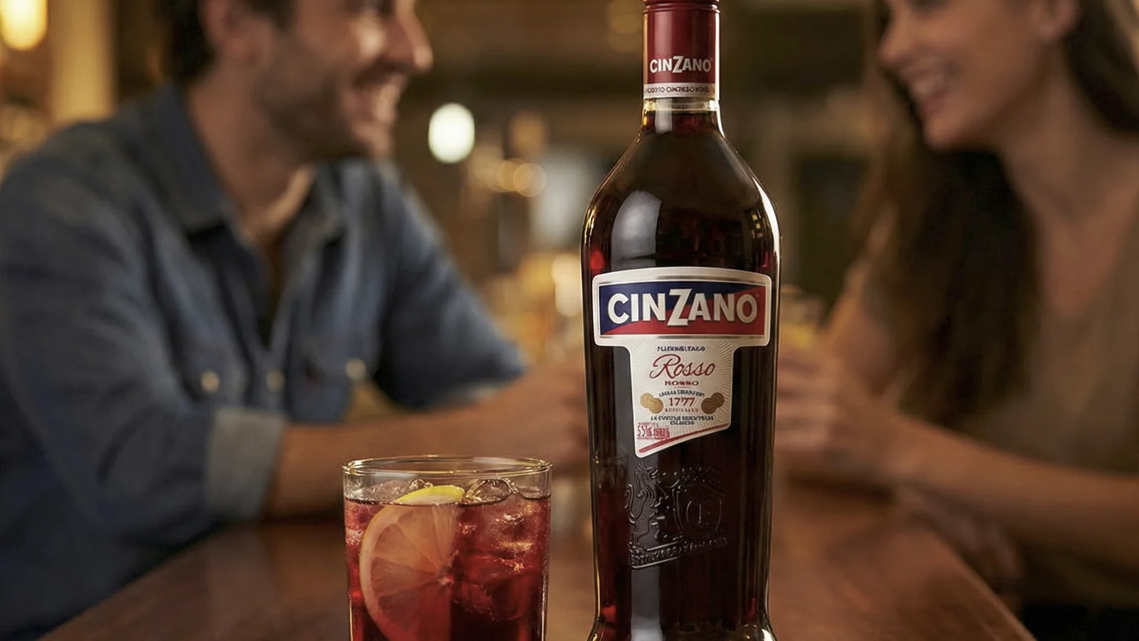 A bottle of Cinzano vermouth on a bar table