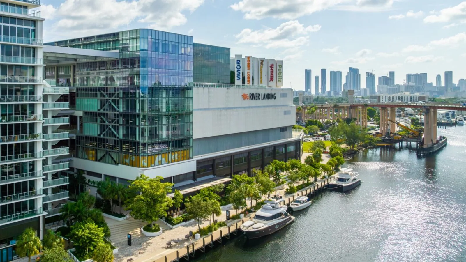 A mixed use development rising beside the Miami River