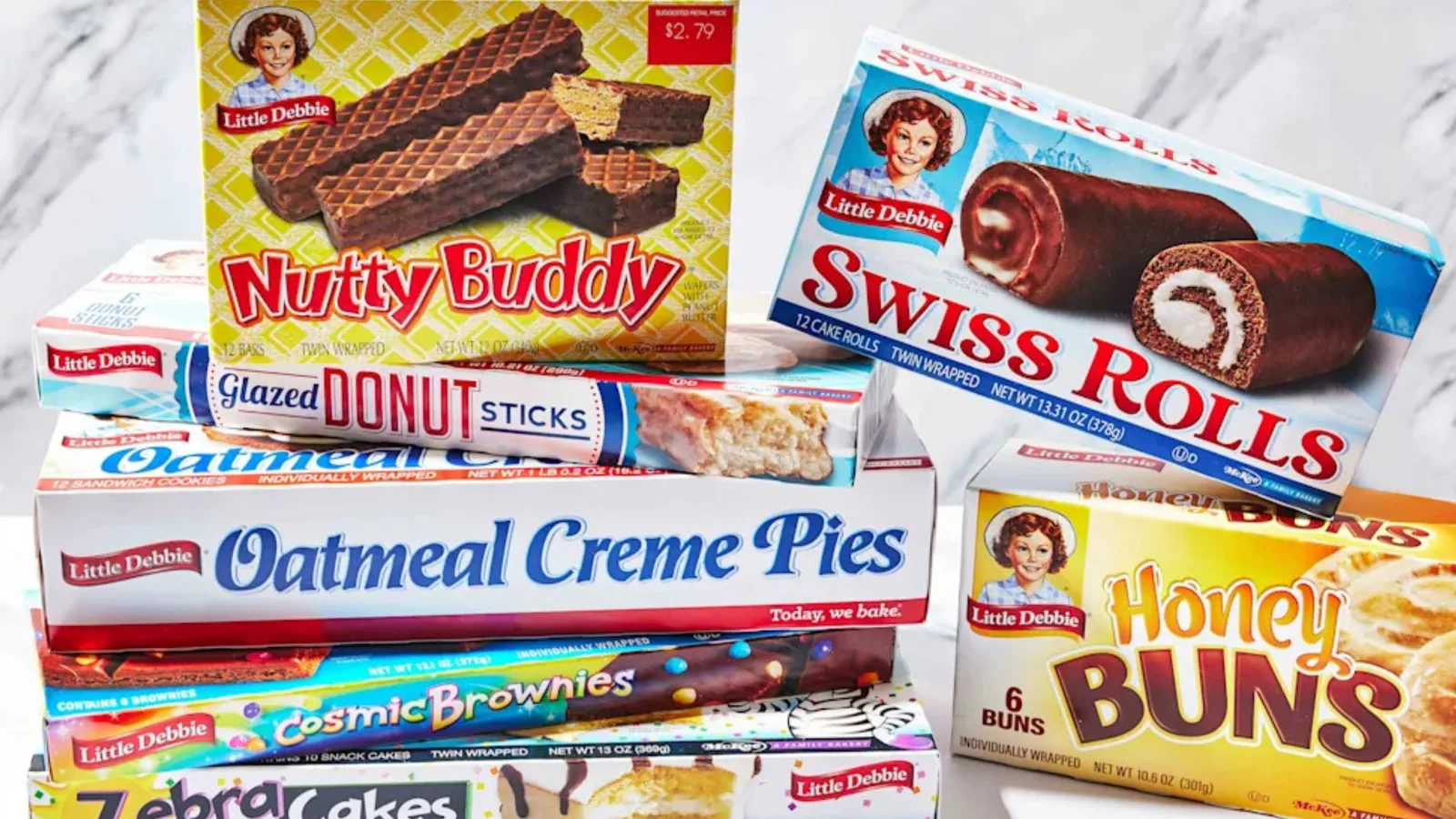 Boxes of American snack cakes stacked on a kitchen counter