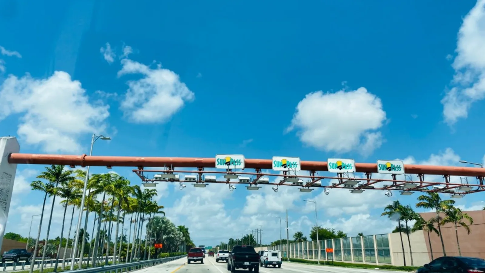 An electronic toll gantry spanning a Florida highway