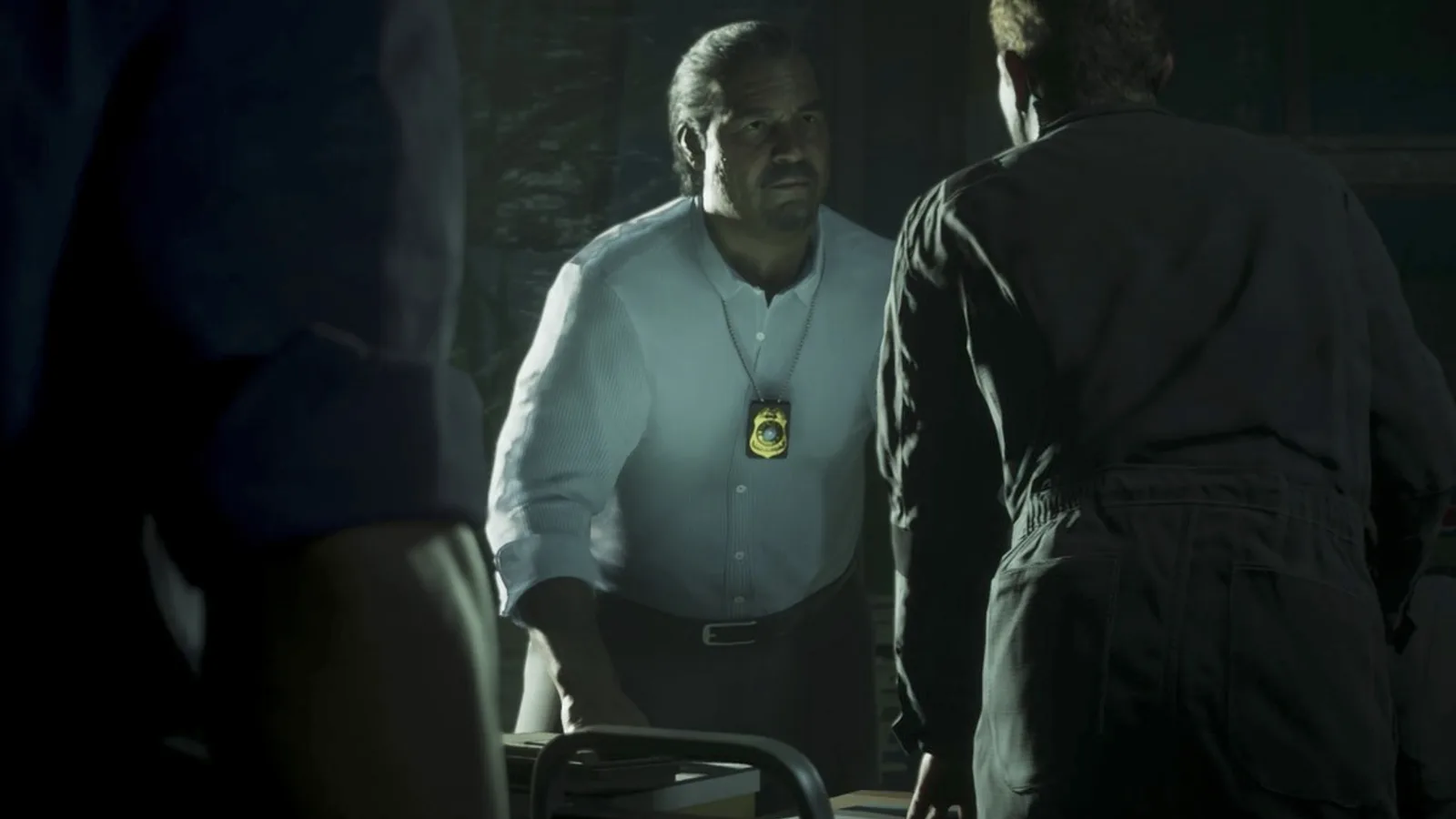 Mendez with his badge on a chain confronting two men in the interrogation scene from GTA 6 Trailer 2.