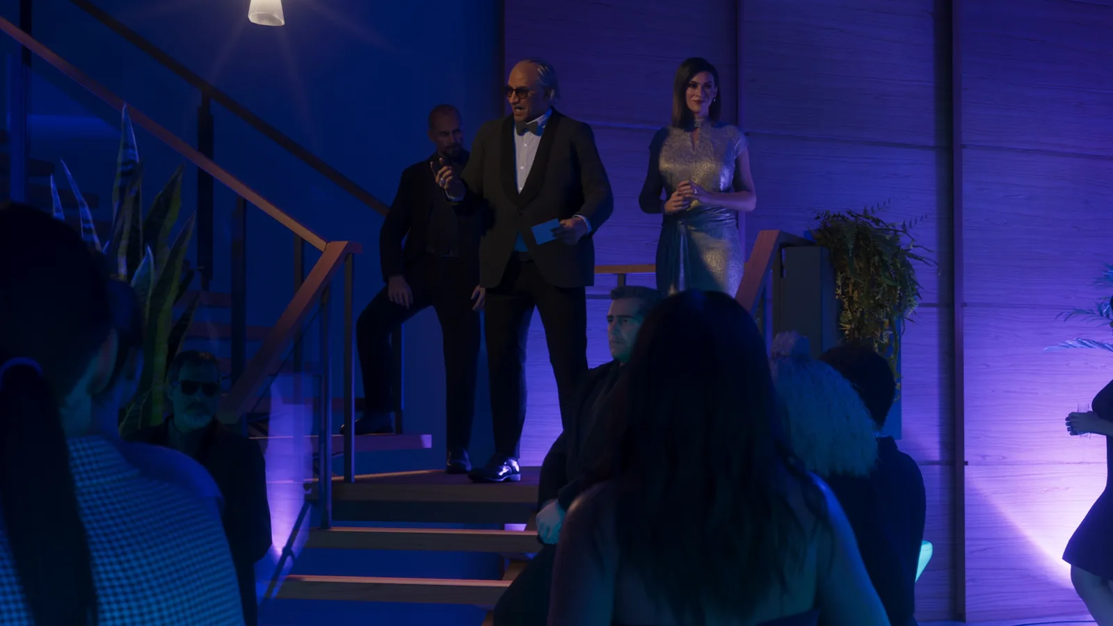 Petra Navarro leading guests down a staircase at the Mega Mundo gala in GTA 6.