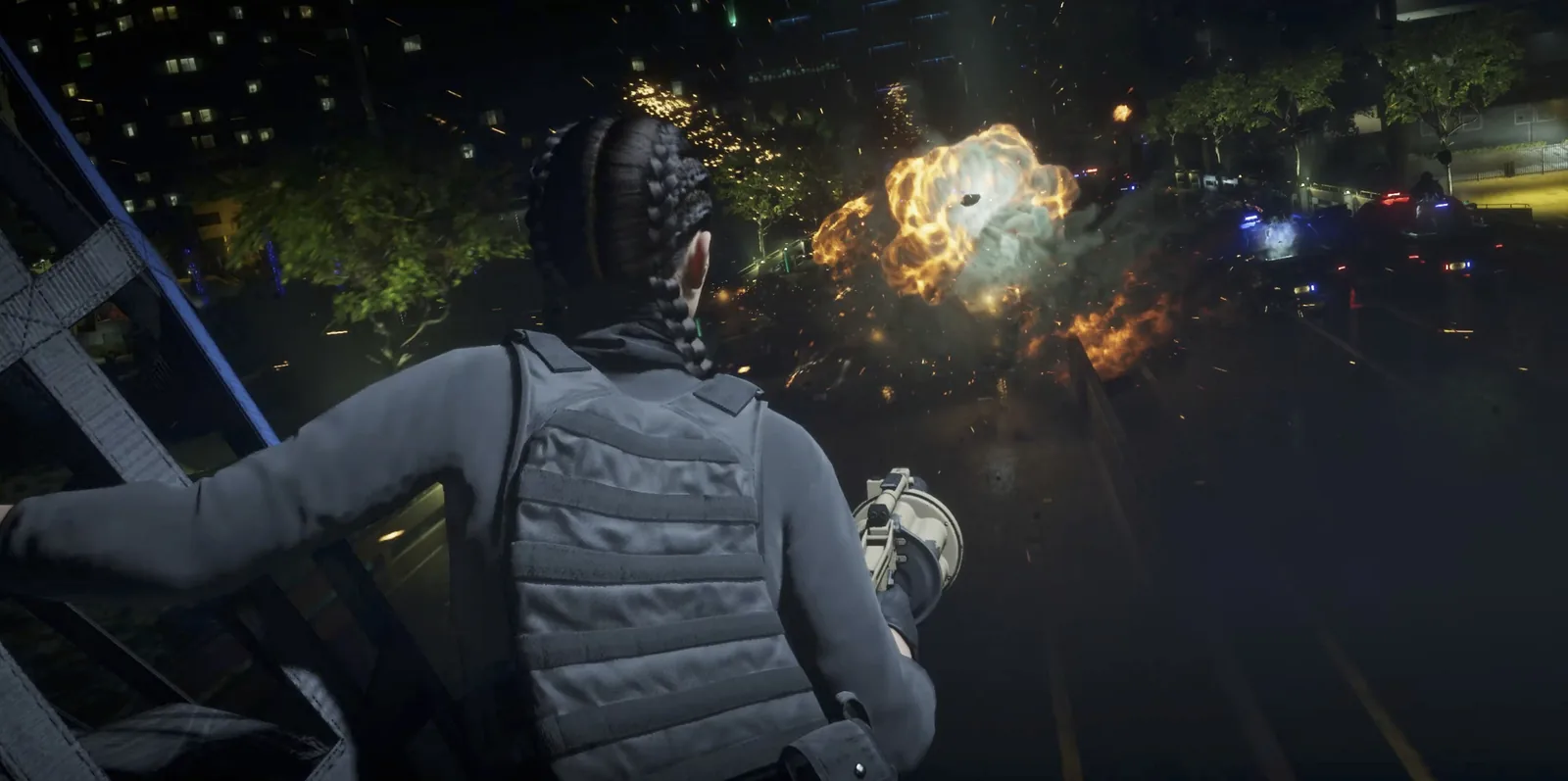 A character in body armour aims down a night street toward an explosion during a chase in the GTA 6 launch trailer