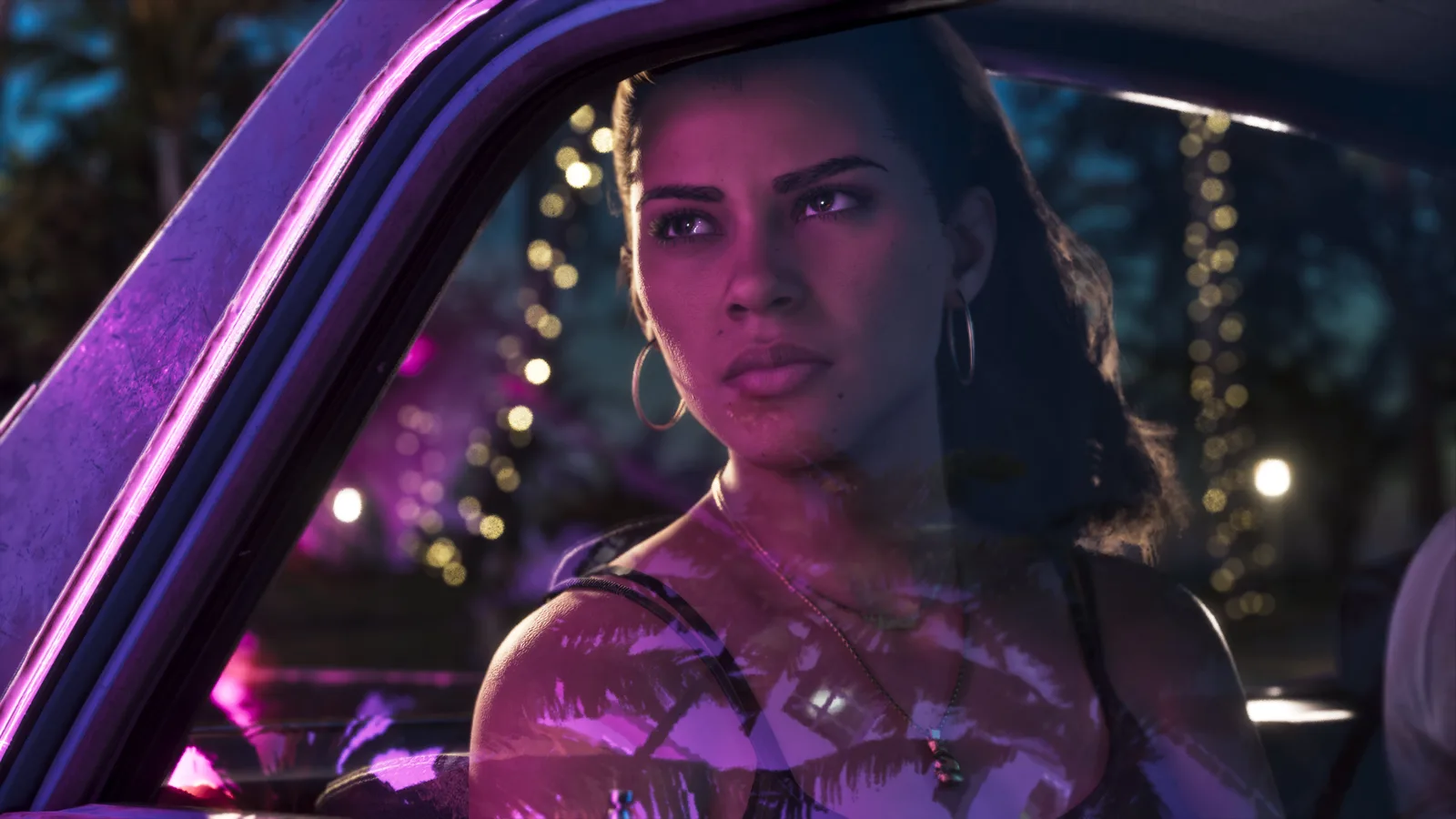 Lucia lit in purple neon behind the wheel of a car at night in GTA 6