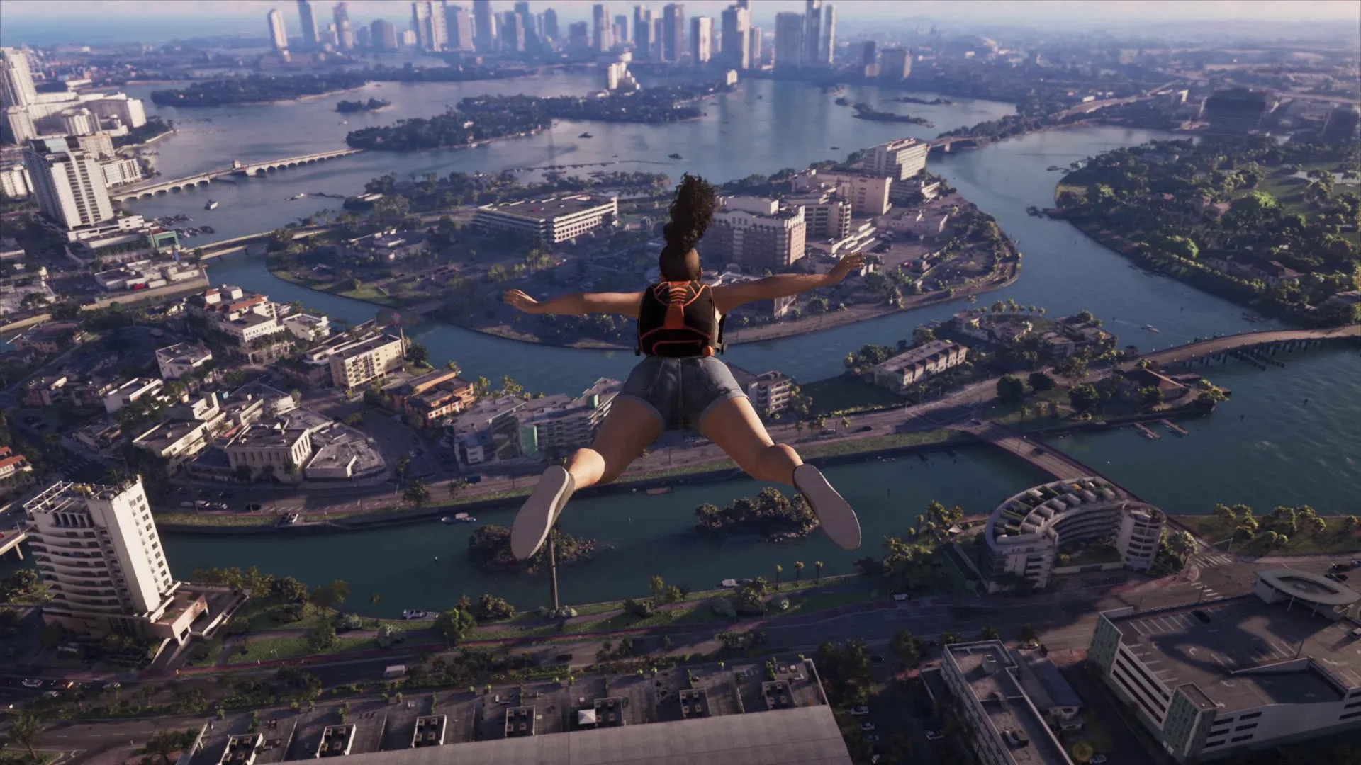 A swan dive from high above Vice City with the bay, islands and causeways stretching to the horizon in GTA 6