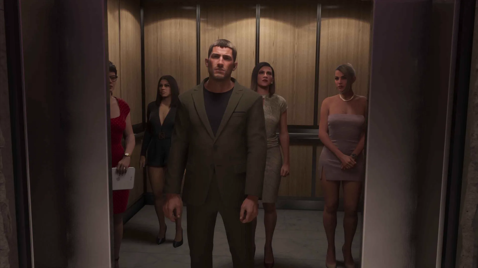 Jason in the elevator with Petra Navarro and other guests heading up from the Mega Mundo gala lobby in GTA 6.