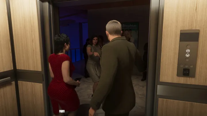 Red dress at the lift doors