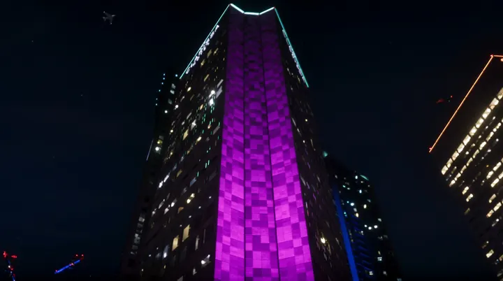 Violet lights climb the highrise