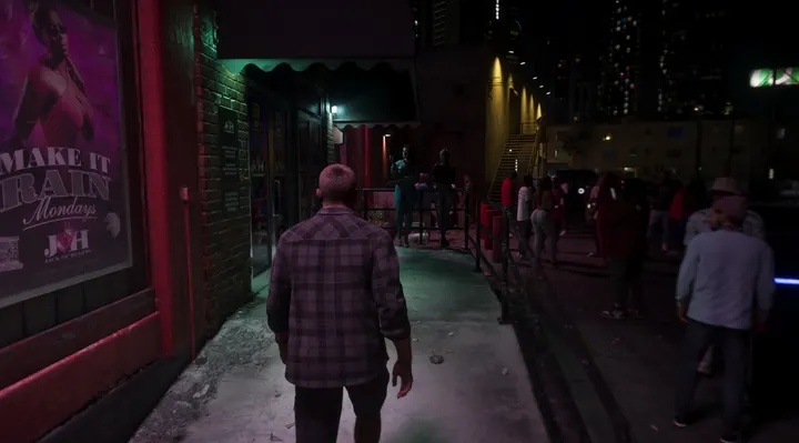 Jason walks past the club queue