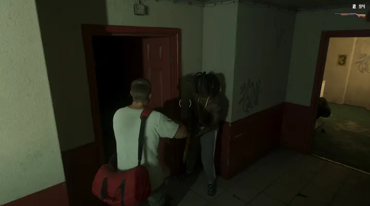 Doorway scuffle in the flats