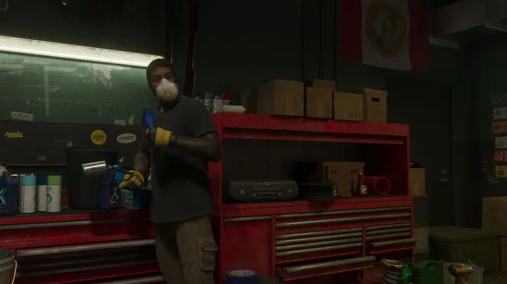 Masked mechanic in the workshop