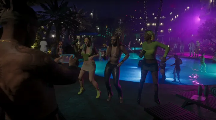 Dancers at the night pool party