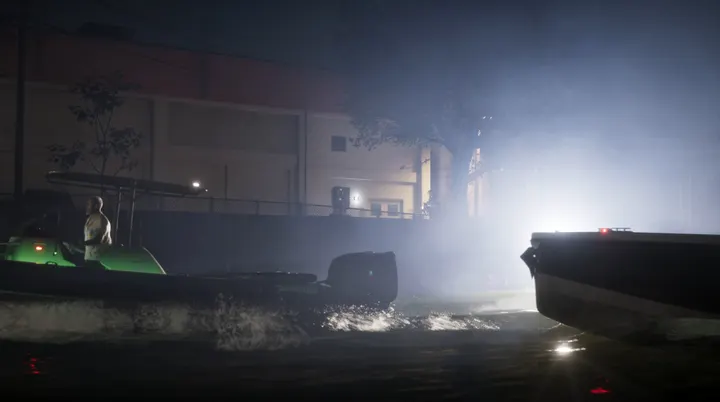 Boats in the midnight mist