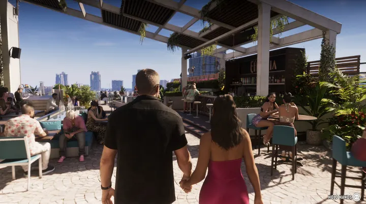Hand in hand at the rooftop bar