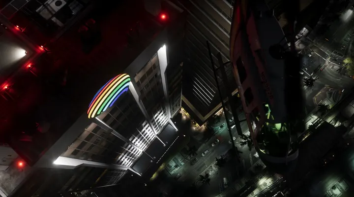 Helicopter over the neon tower
