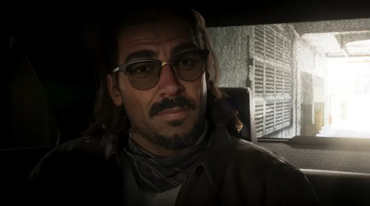 Bespectacled man in the car