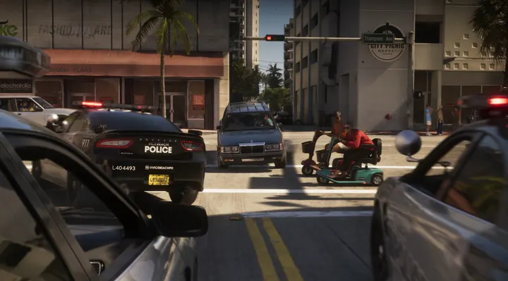 Scooter crawls past the patrol cars