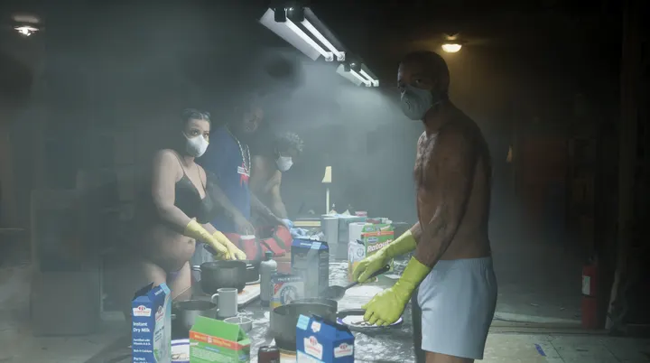 Cooks in the smoky kitchen