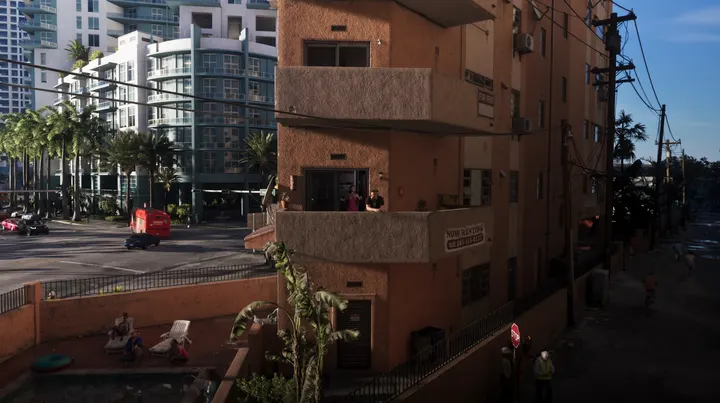 Couple on the corner balcony
