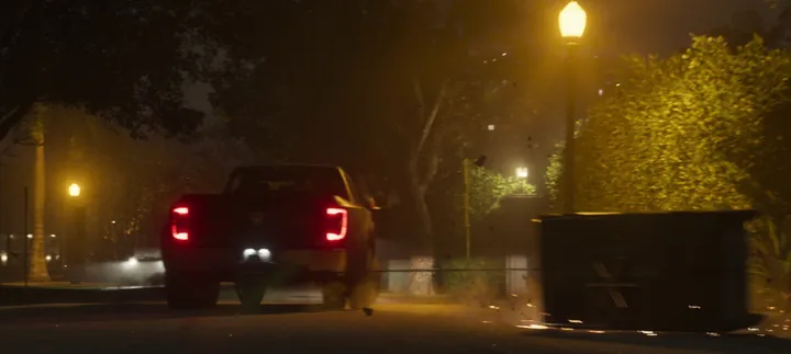 Taillights down the dark street