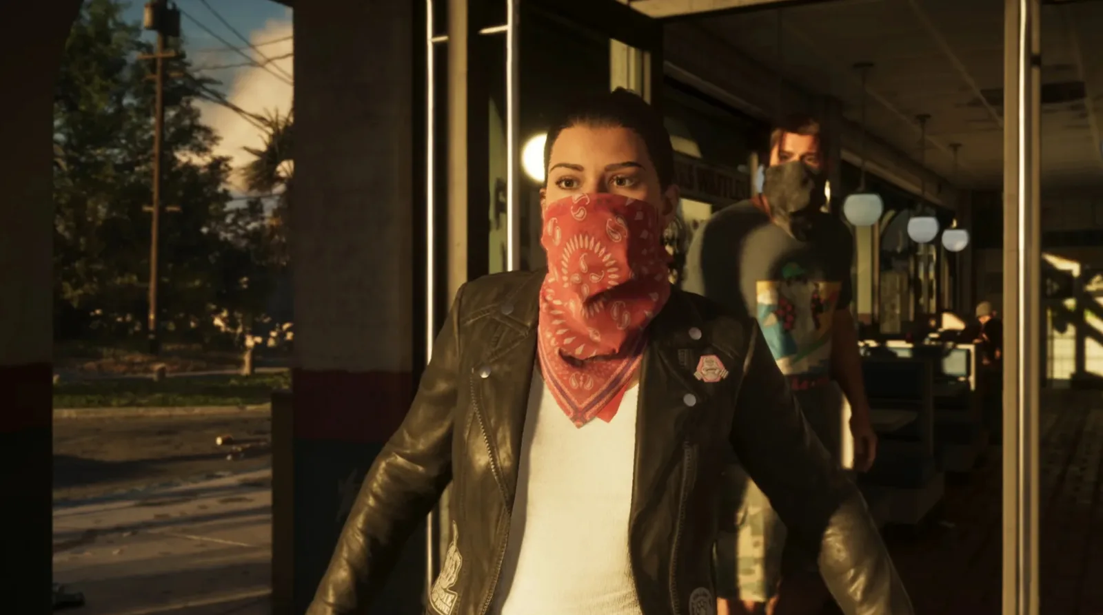 Lucia wearing a red bandana mask inside a doorway in GTA 6