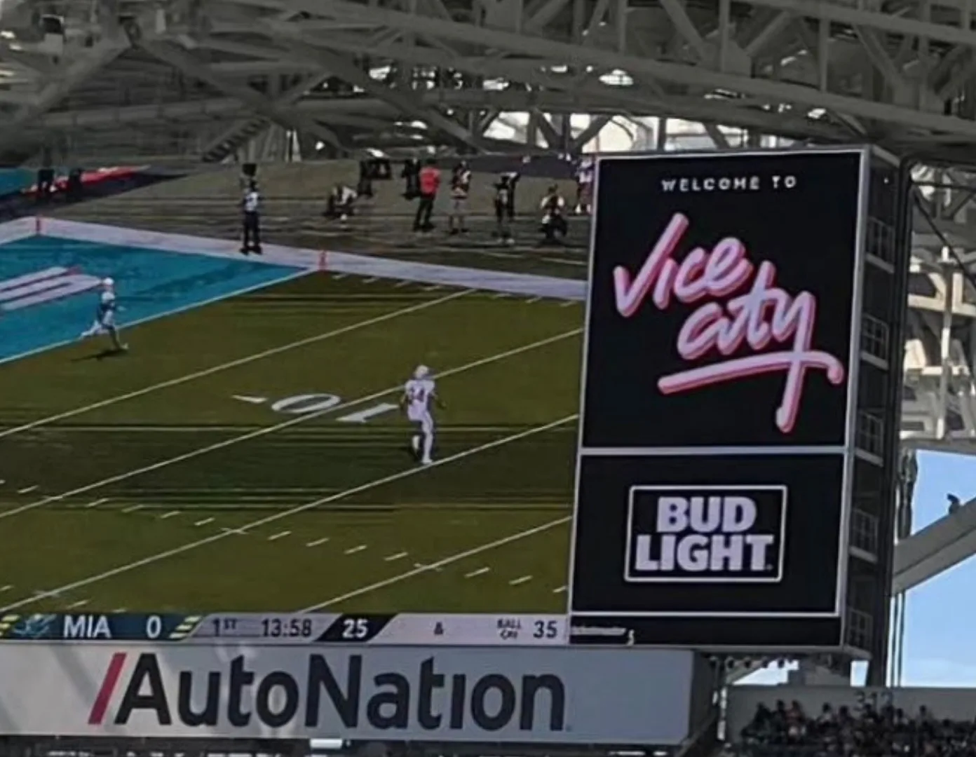 Welcome to Vice City panel in pink script on the Hard Rock Stadium video board above a Bud Light sign