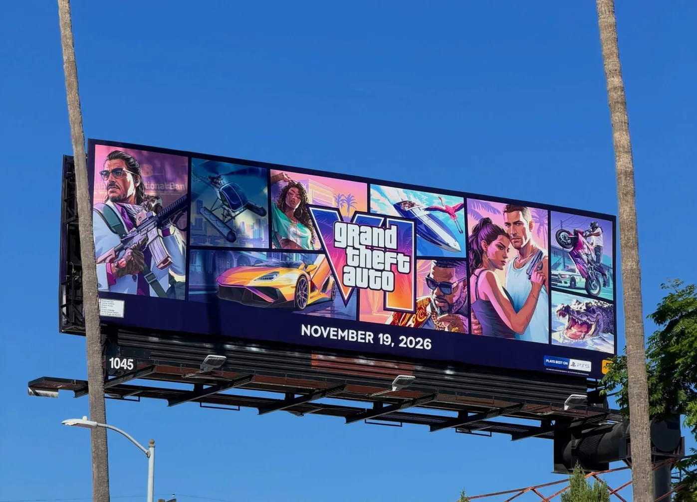 Roadside billboard showing GTA 6 key art and the November 19, 2026 release date
