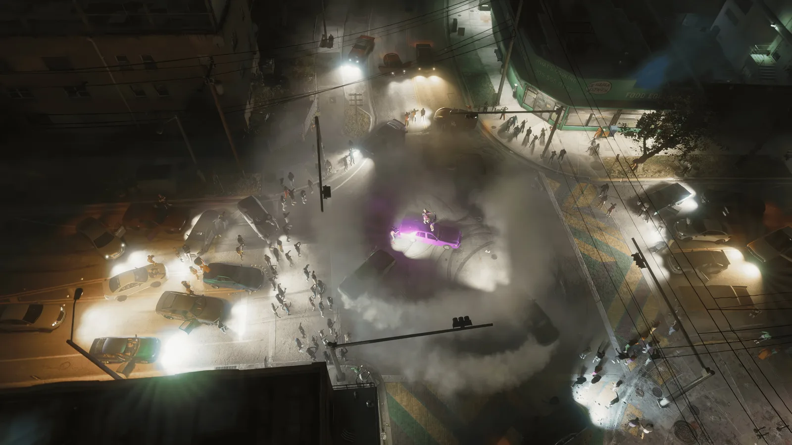 Aerial night view of a police operation with headlights and smoke filling a Vice City lot in GTA 6
